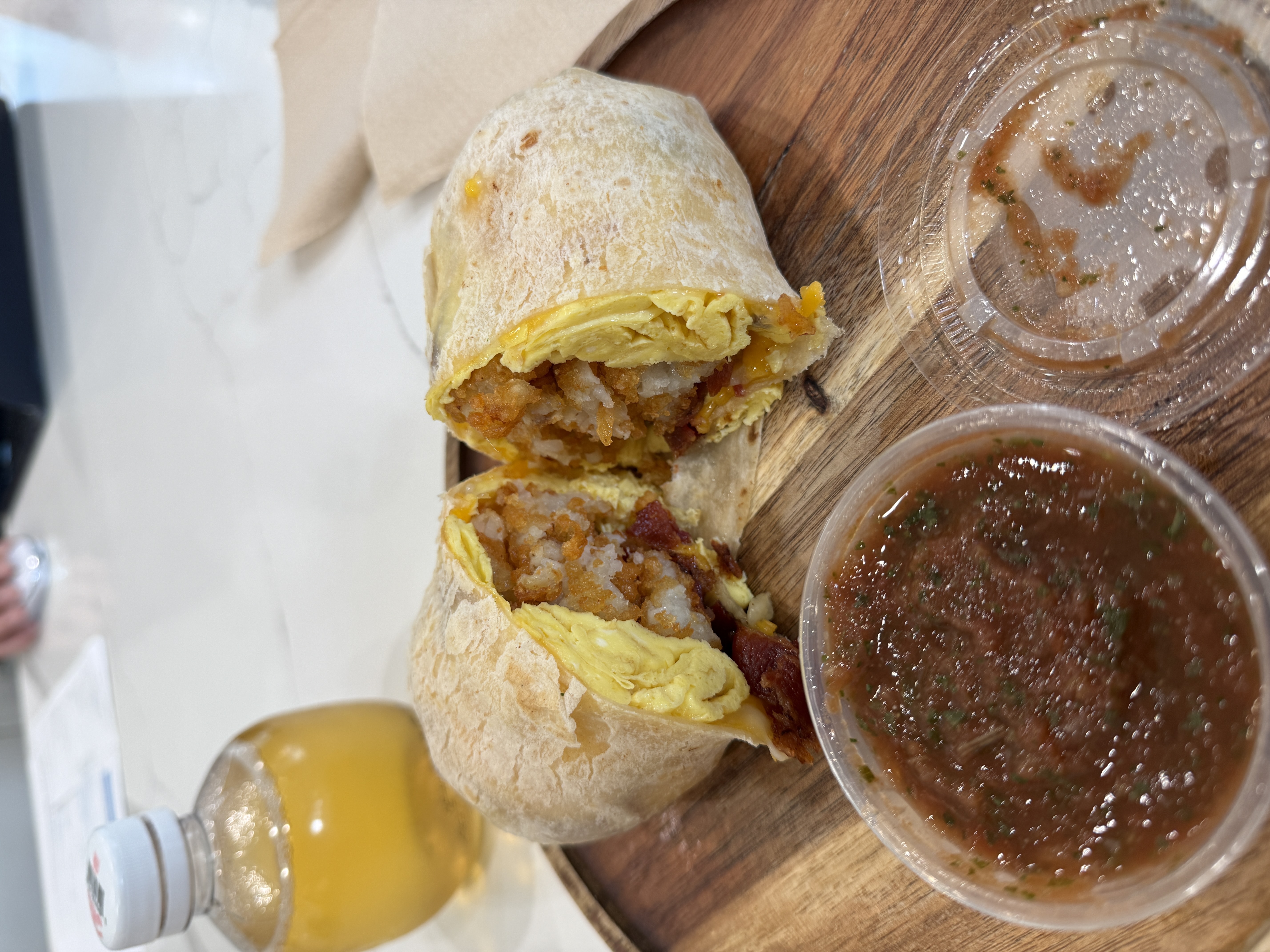 bacon breakfast burrito with salsa