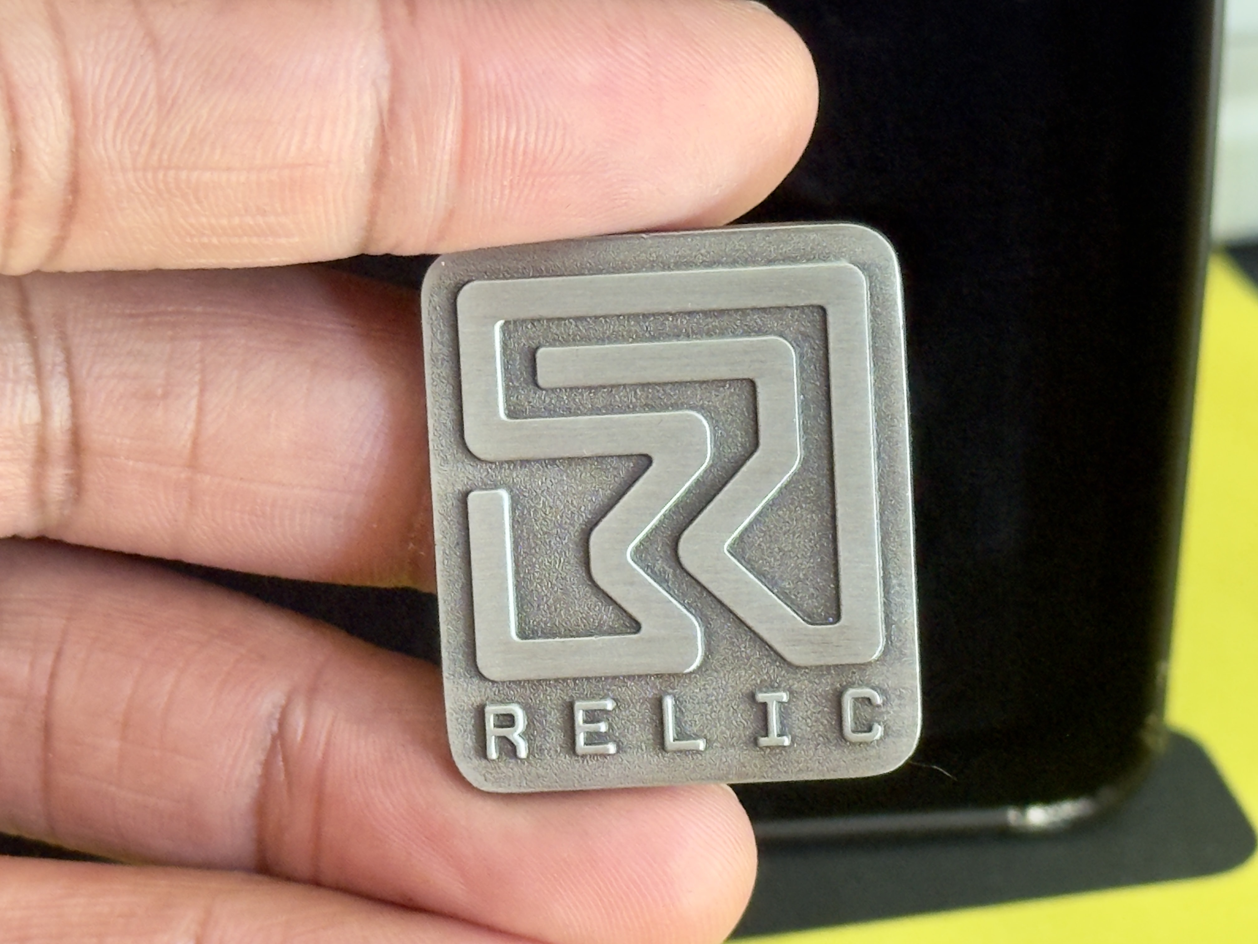 Relic logo pin