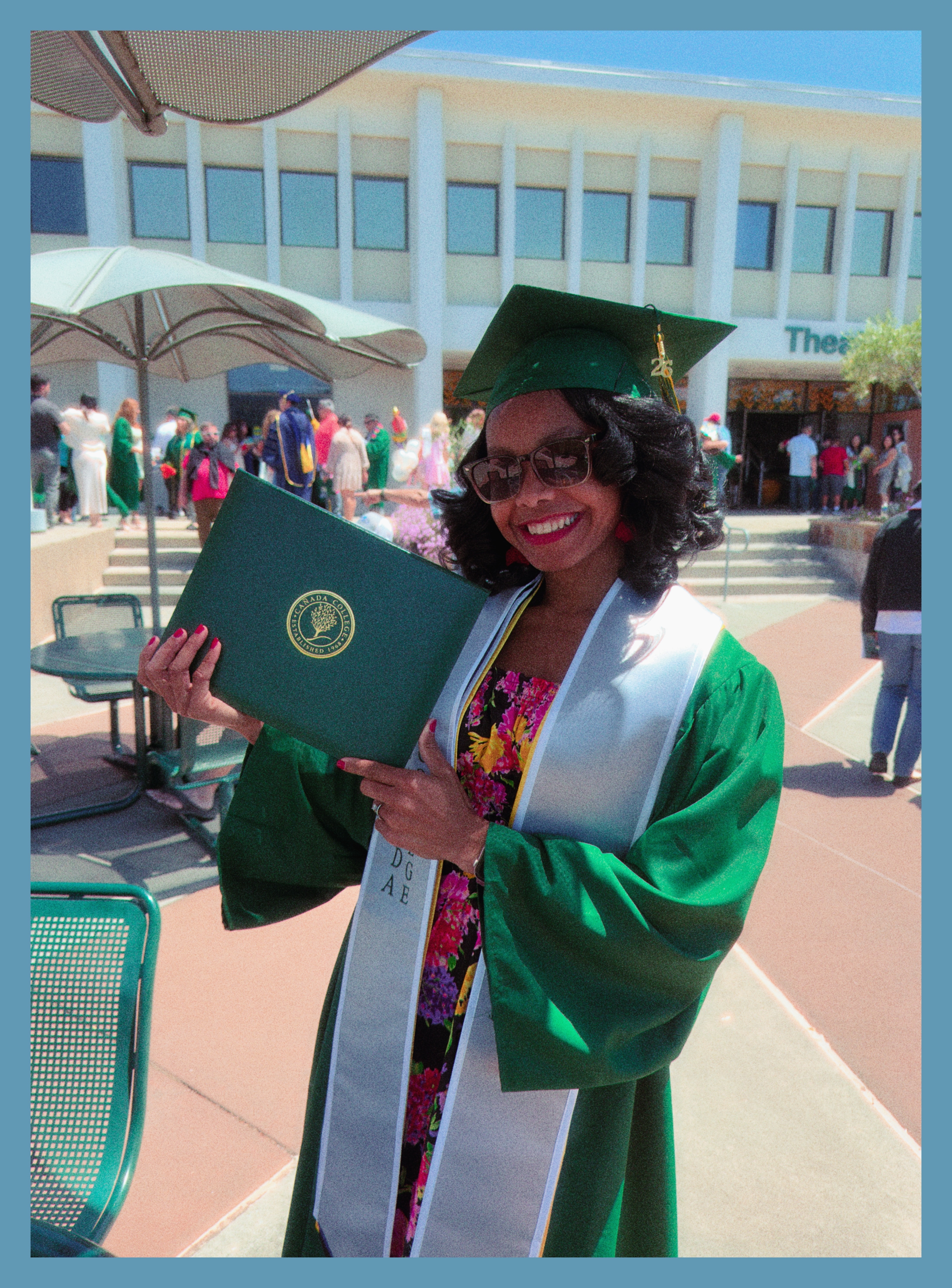 Lakeisha posing with her degree