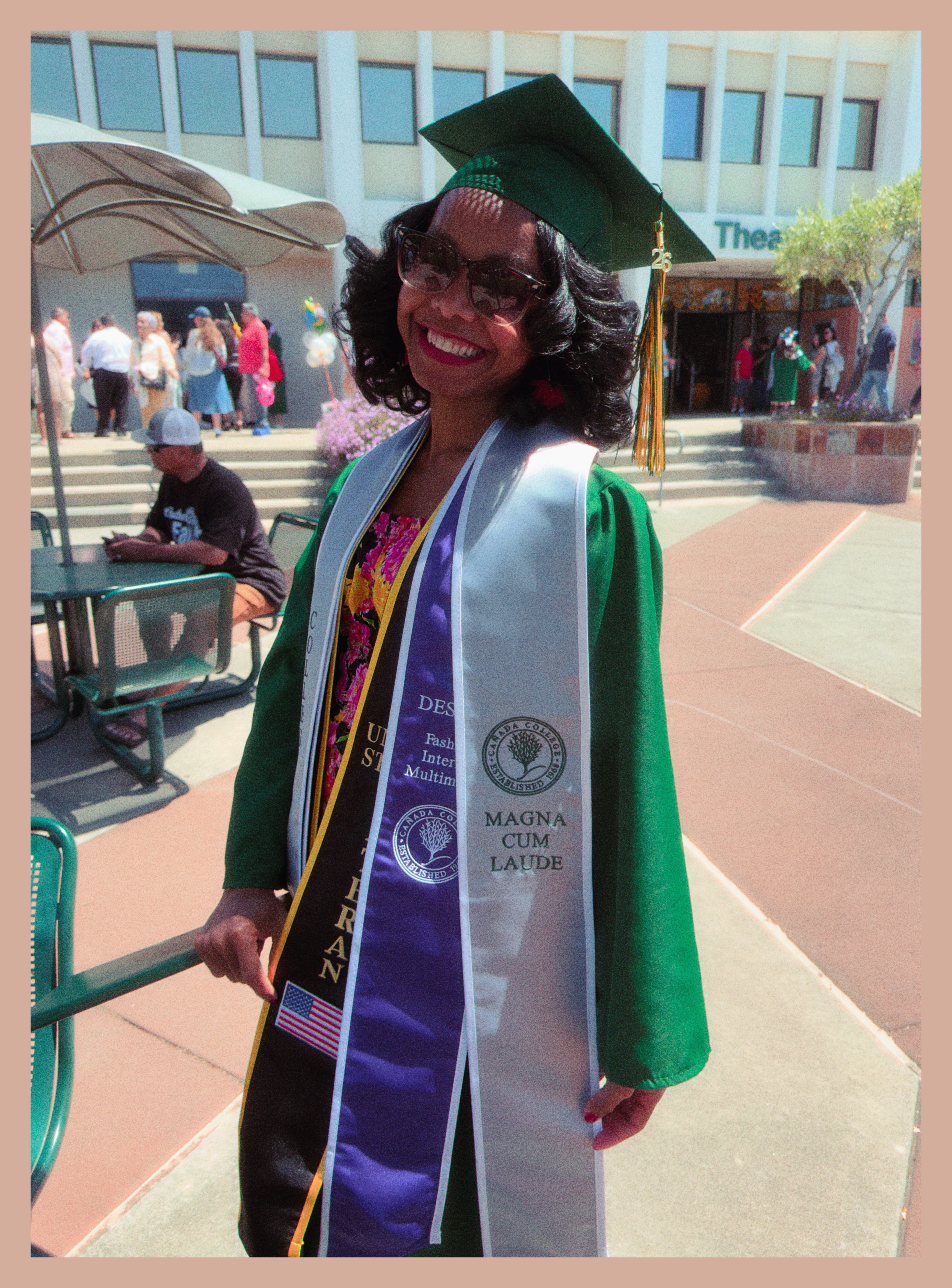 Lakeisha showing off her graduation sashes