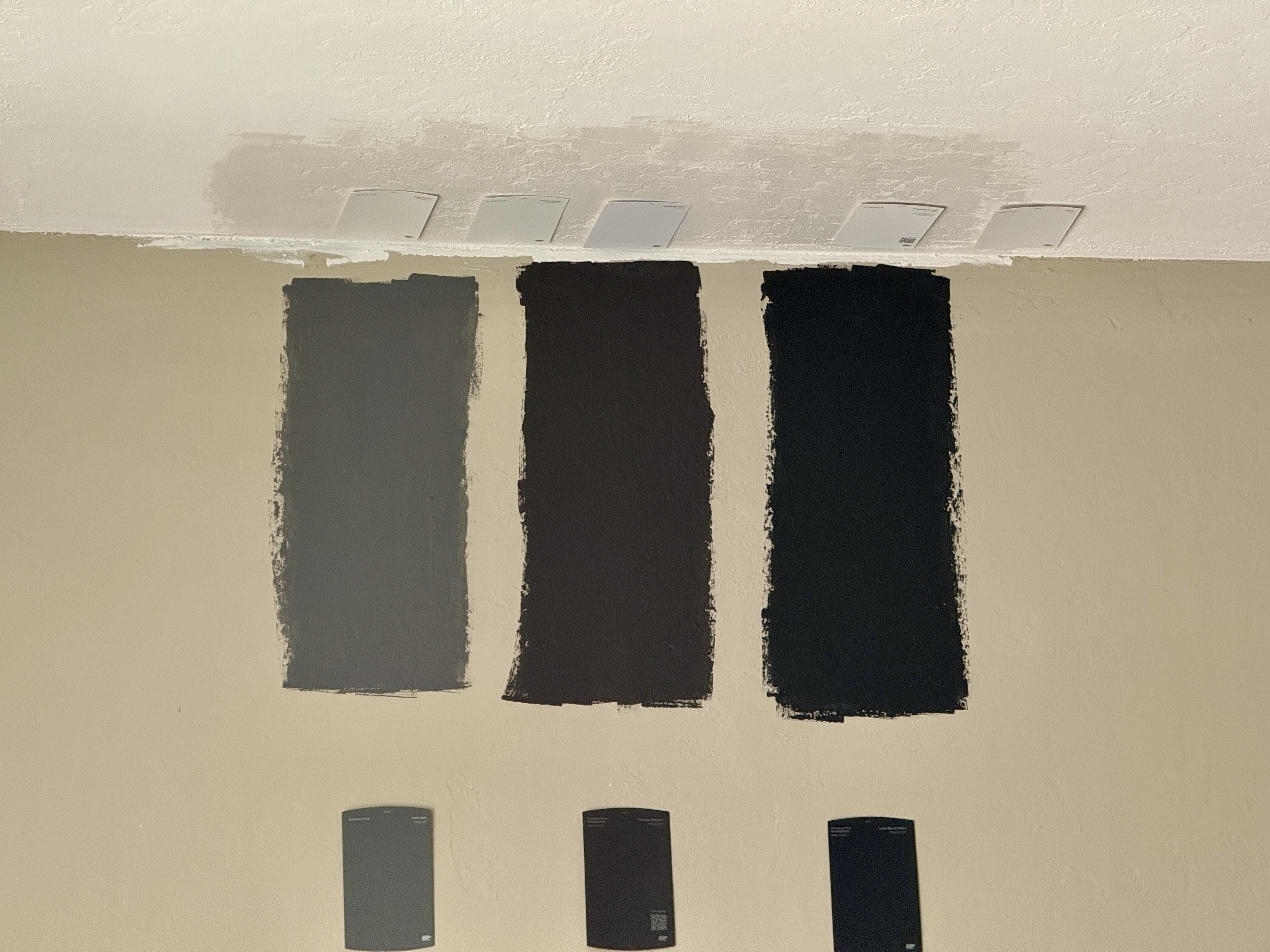 Painted swatches on the wall and ceiling