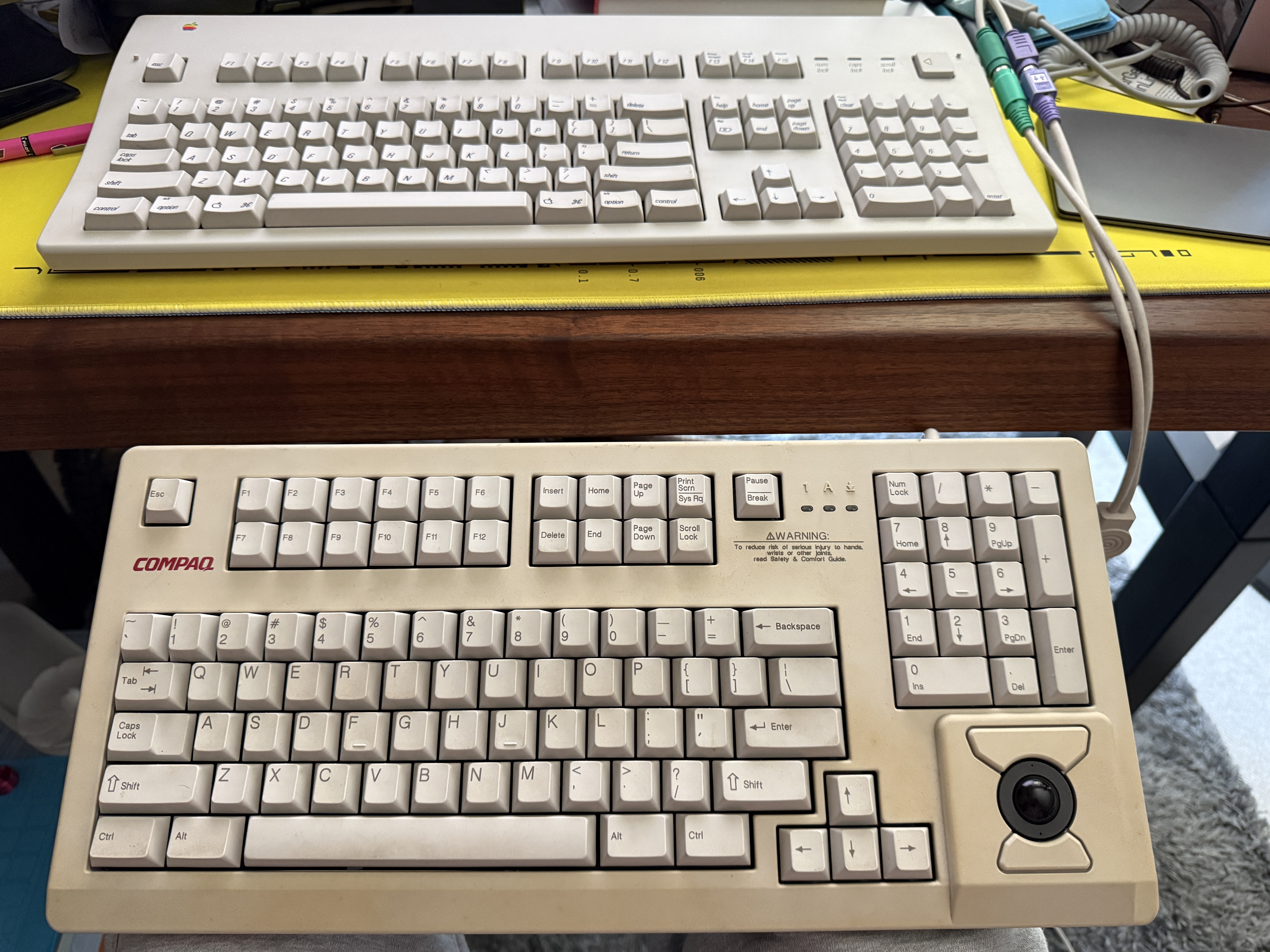 dusty Compaq MX-11800 below a like-new AEK II