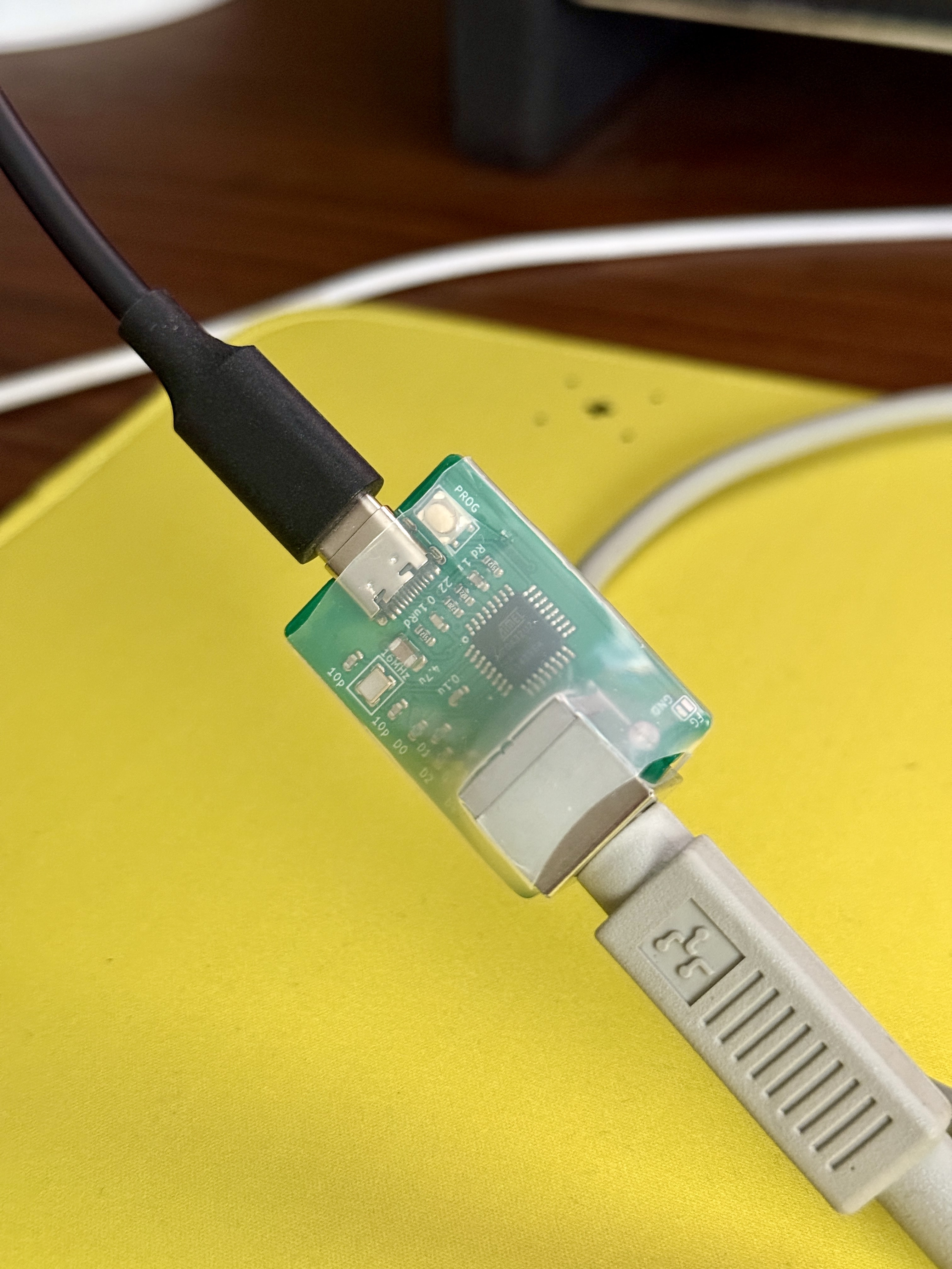 ADB adapter connected to my MacBook and keyboard